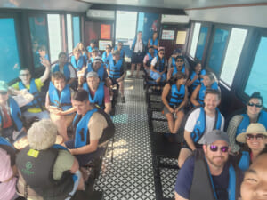 Cozy Bay Cruise Halong Bay Group Transfer Boat Guests 01 - Best Halong Cruise 2026