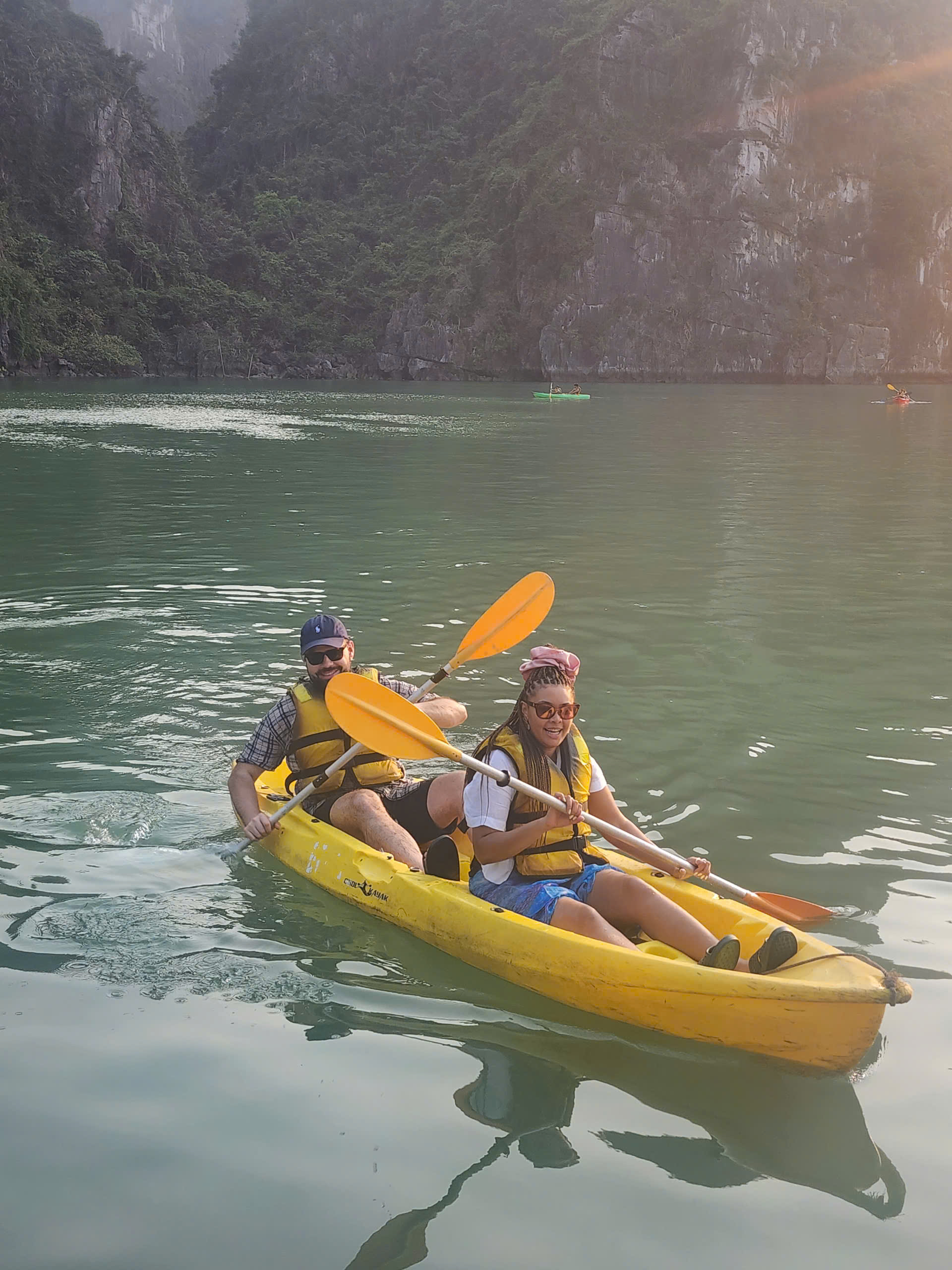 Cozy Bay Cruise Halong Bay Kayaking Yellow Kayak Sunshine 01 - Best Halong Cruise 2026